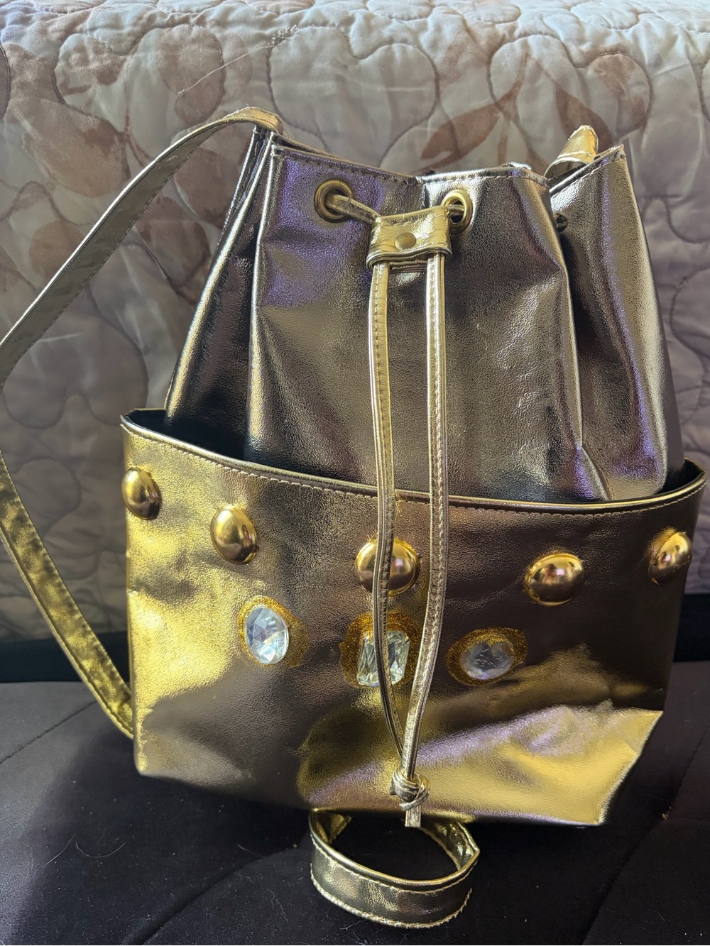 Metallic Gold Drawstring Crossbody Bucket Bag with Jewel Accents